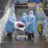 In Quarantined Wuhan, Hospital Beds For Coronavirus Patients Are Scarce